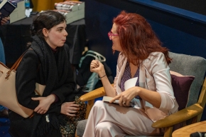 Rachael Mogan McIntosh signs copies of her novel. Photo by Greg Jackson. 
