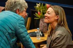 Kylie Needham signs copies of her novel. Photo by Greg Jackson. 