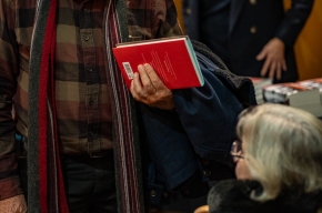 Posie Graeme-Evans signs copies of her novels. Photo by Greg Jackson. 