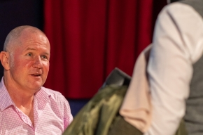 Glen Humphries signs copies of his new book. Photo by Greg Jackson. 