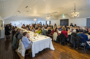 Literary Lunch diners prepare for an Indian feast. Photo by Greg Jackson.