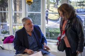 Mikey Robins signs copies of his latest book, even Deadly Sins and One Very Naughly Fruit. Photo by Greg Jackson. 
