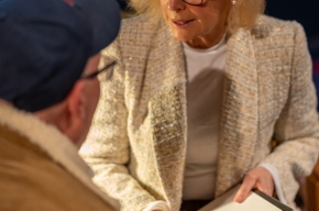 Liz Hayes signs copies of her new memoir. Photo by Greg Jackson. 