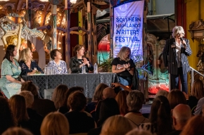 Local sculptor, Julie Haseler Reilly, talks about how she got involved with The Charlotte Project. Photo by Greg Jackson.