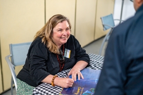 Jasmine Seymour signs copies of her books. Photo by Greg Jackson. 
