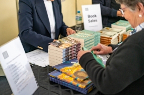 Jasmine Seymour signs copies of her books. Photo by Greg Jackson. 